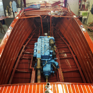 A picture of the inside of a boat and the engine