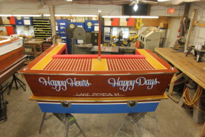 A picture of the back end of a boat in a workshop